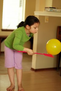 balloon game girl balancing