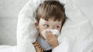 boy unwell stuffy nose